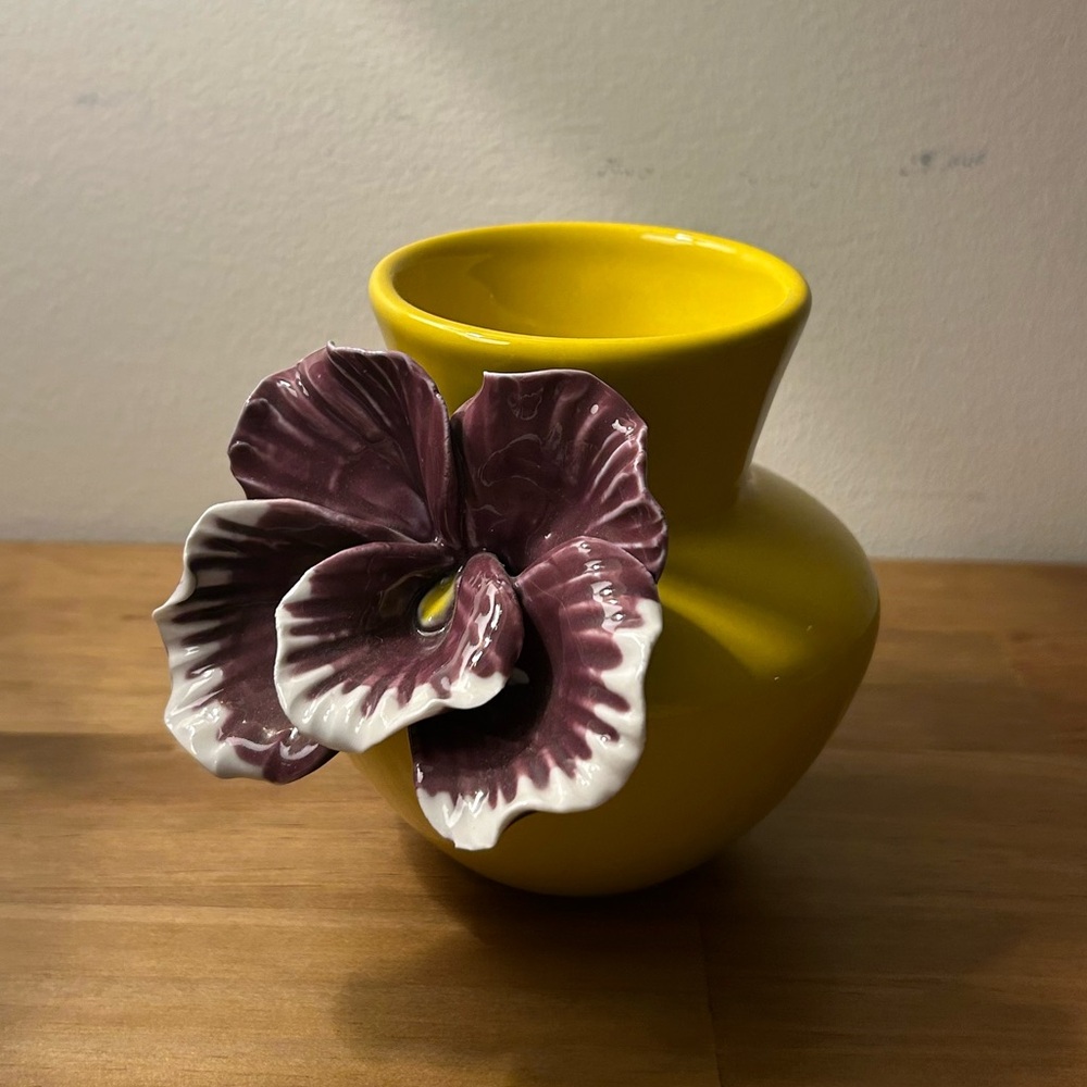 Anthropologie yellow vase with purple ceramic flower